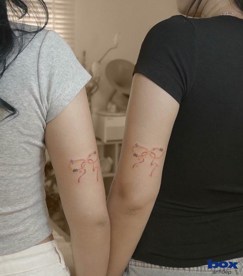 hình xăm bắp tay nữ cặp đôi