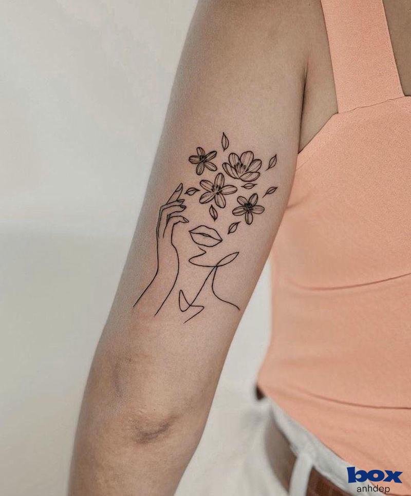 hình xăm bắp tay nữ môi