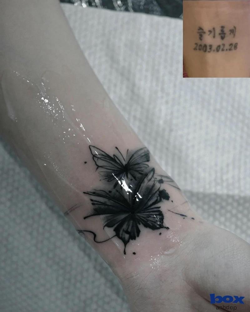 hình xăm cổ tay nam cánh bướm đen