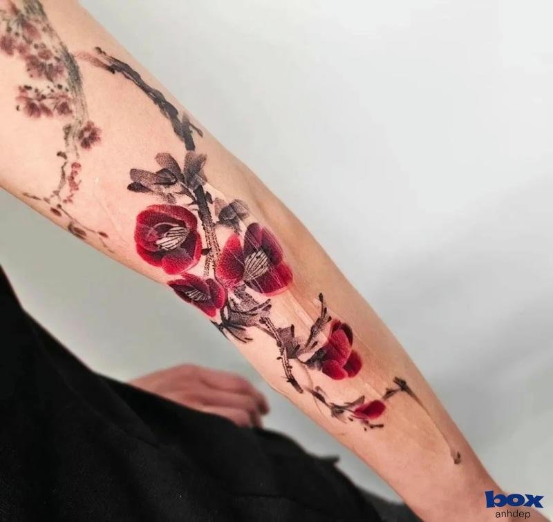 hình xăm may mắn tài lộc cho nam nở hoa