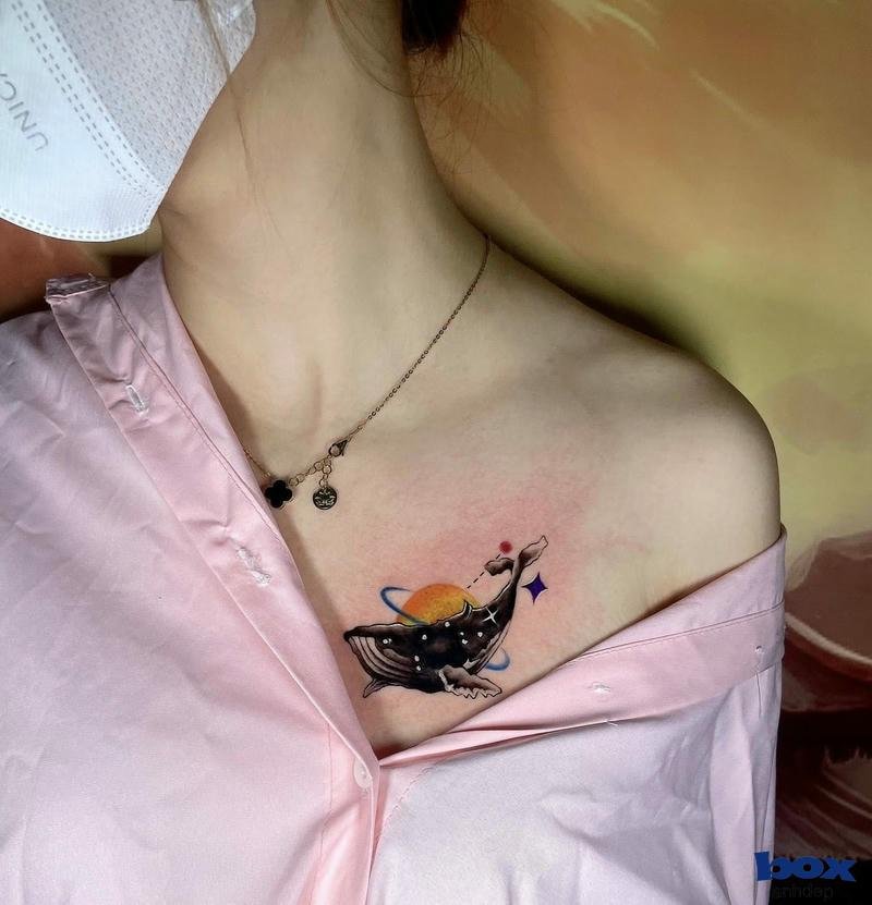 hình xăm ở ngưc cho nữ cá nheo